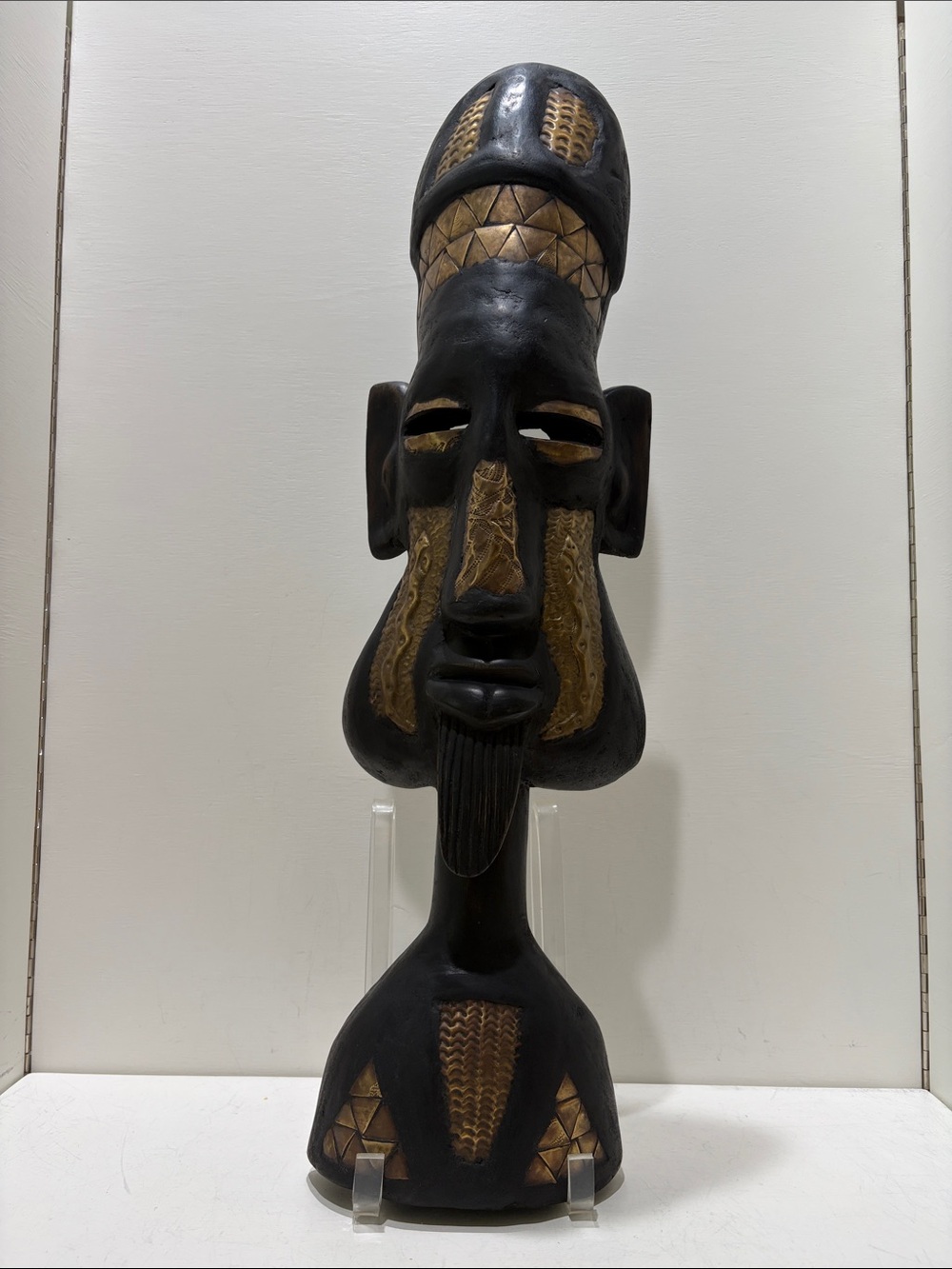 Hand-Carved Black and Brass Tribal Mask from Ghana